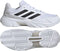The adidas CourtJam Control 3 Men’s Tennis Shoes in Cloud White, Core Black, and Grey feature black side stripes, a textured sole with deep grooves for traction and court stability, and "COURTTEAM" near the heel.