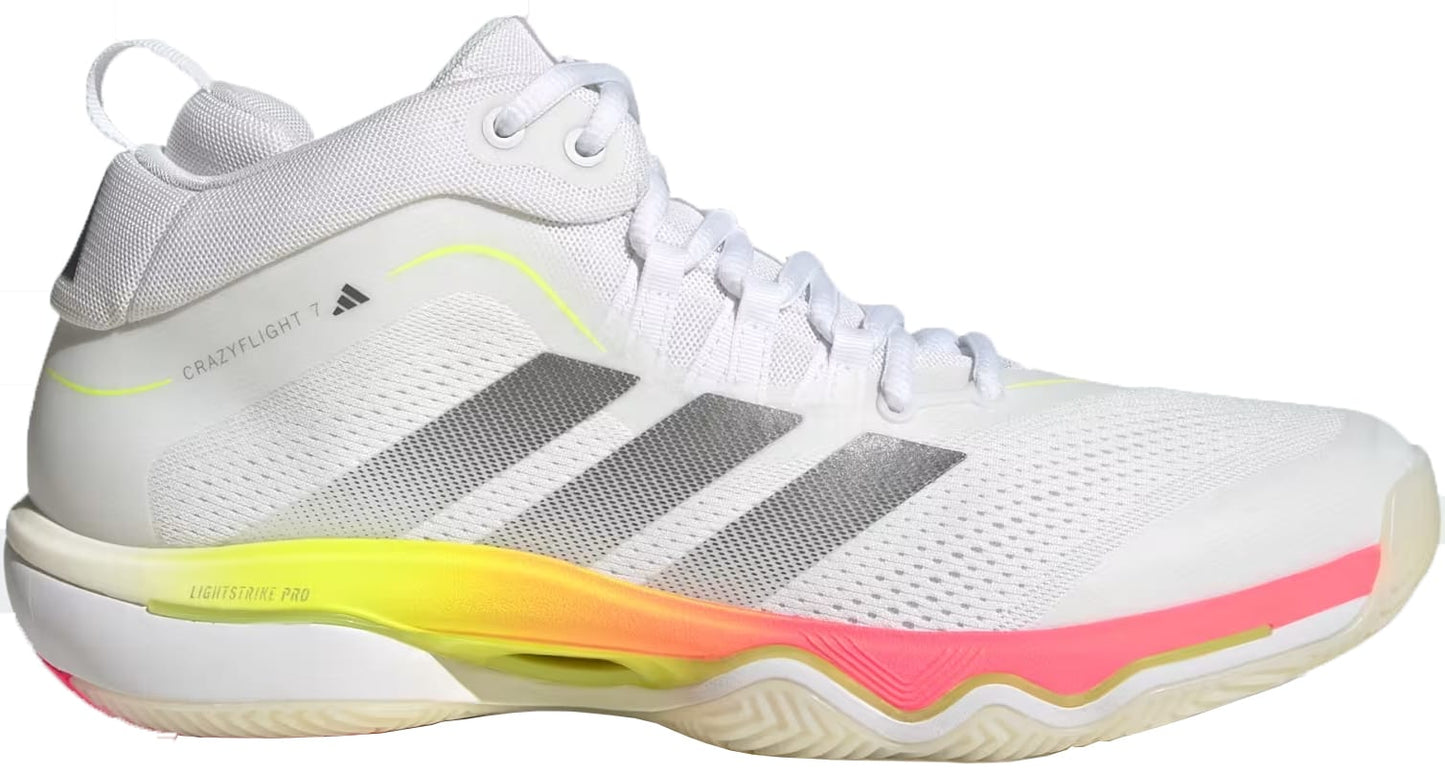 The adidas Crazyflight 7 Men's Indoor Tennis Shoes feature a white mesh upper, gray stripes, high collar, and BOOST midsole with neon yellow/pink accents. Stylish "Crazyflight" branding completes this Cloud White/Iron Metallic design.