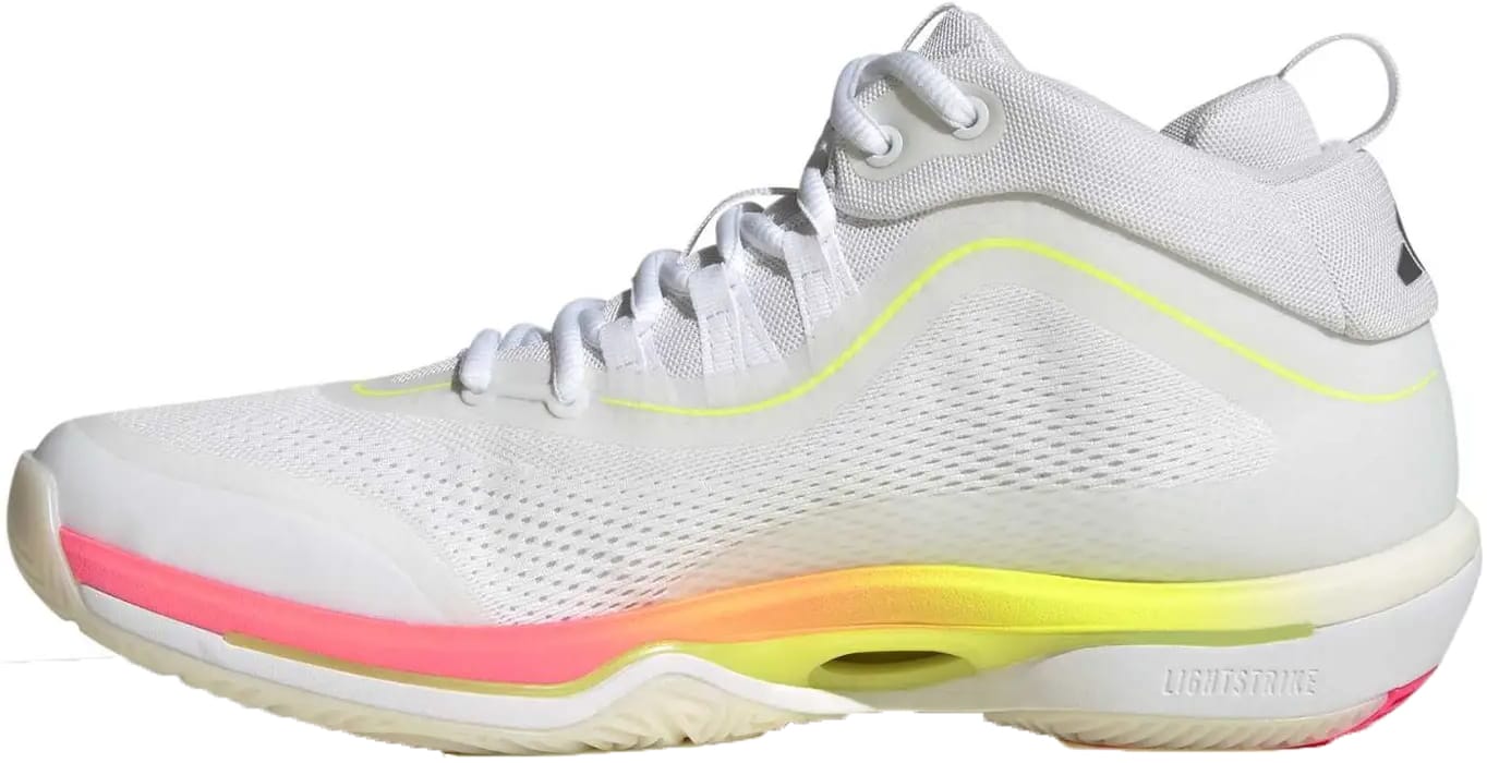 The adidas Crazyflight 7 Mens Indoor Tennis Shoes in Cloud White/Iron Metallic feature mesh panels, yellow-pink gradient accents on the midsole, a high-ankle design, Lightstrike cushioning above the sole, and a textured beige outsole for indoor tennis.