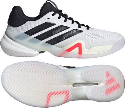 The adidas Barricade 14 WIDE Men's Tennis Shoes in white feature black stripes, black laces, a black heel, pink accents near the arch, and a herringbone tread—perfect wide tennis shoes for hard courts.