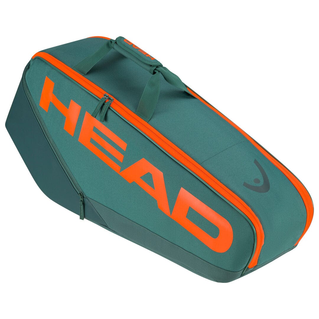 The HEAD Pro Racket Tennis Bag - L - DYFO, in a striking green and orange color scheme, features bold orange "HEAD" lettering on the side. It is equipped with orange zippers and sturdy green handles, all designed to carry and protect your tennis equipment with Climate Control Technology.