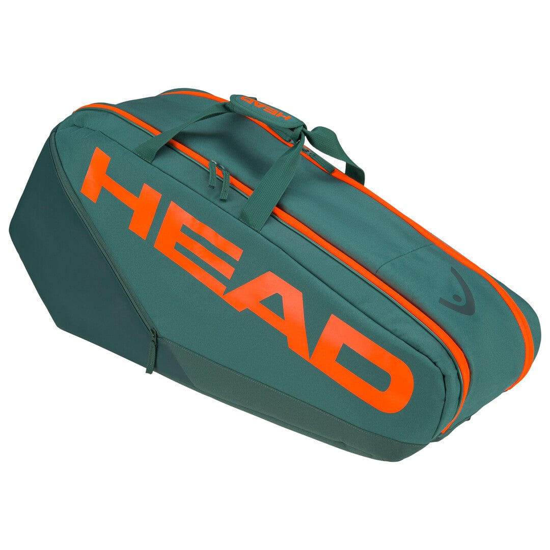 The HEAD Pro Racket Tennis Bag - M - DYFO in green and orange showcases "HEAD" in bold orange lettering. It includes a zipper pocket and robust handles, making it ideal for club players to carry their racquets and sports gear with ease.