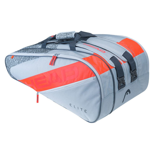 Introducing the HEAD Elite 12R Tennis Racket Bag in Grey and Orange by HEAD, designed with multiple zippered compartments and convenient carrying handles. This spacious bag, adorned with an abstract pattern, features "HEAD" and "ELITE" prominently printed on the side—perfect for effortlessly carrying all your tennis gear.
