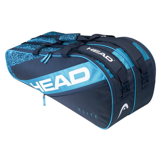 The HEAD Elite 9R Tennis Racket Bag - Blue Navy is a stylish blue and black bag designed to hold up to 9 rackets. It features two compartments and padded straps for comfortable carrying, with the "HEAD" brand prominently displayed in large white letters on the side and "HEAD Elite" in smaller letters near the bottom for a sleek appearance.
