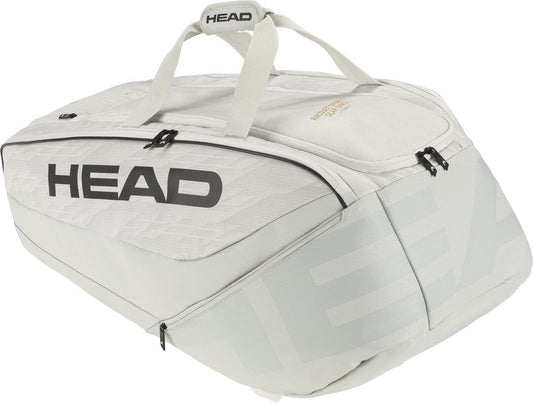 The HEAD Pro X Tennis Racket Bag, part of the SPEED racquet series, is available in off white with dual handles on top and a prominent black logo on the side. It offers multiple zippered compartments for storing sports gear.
