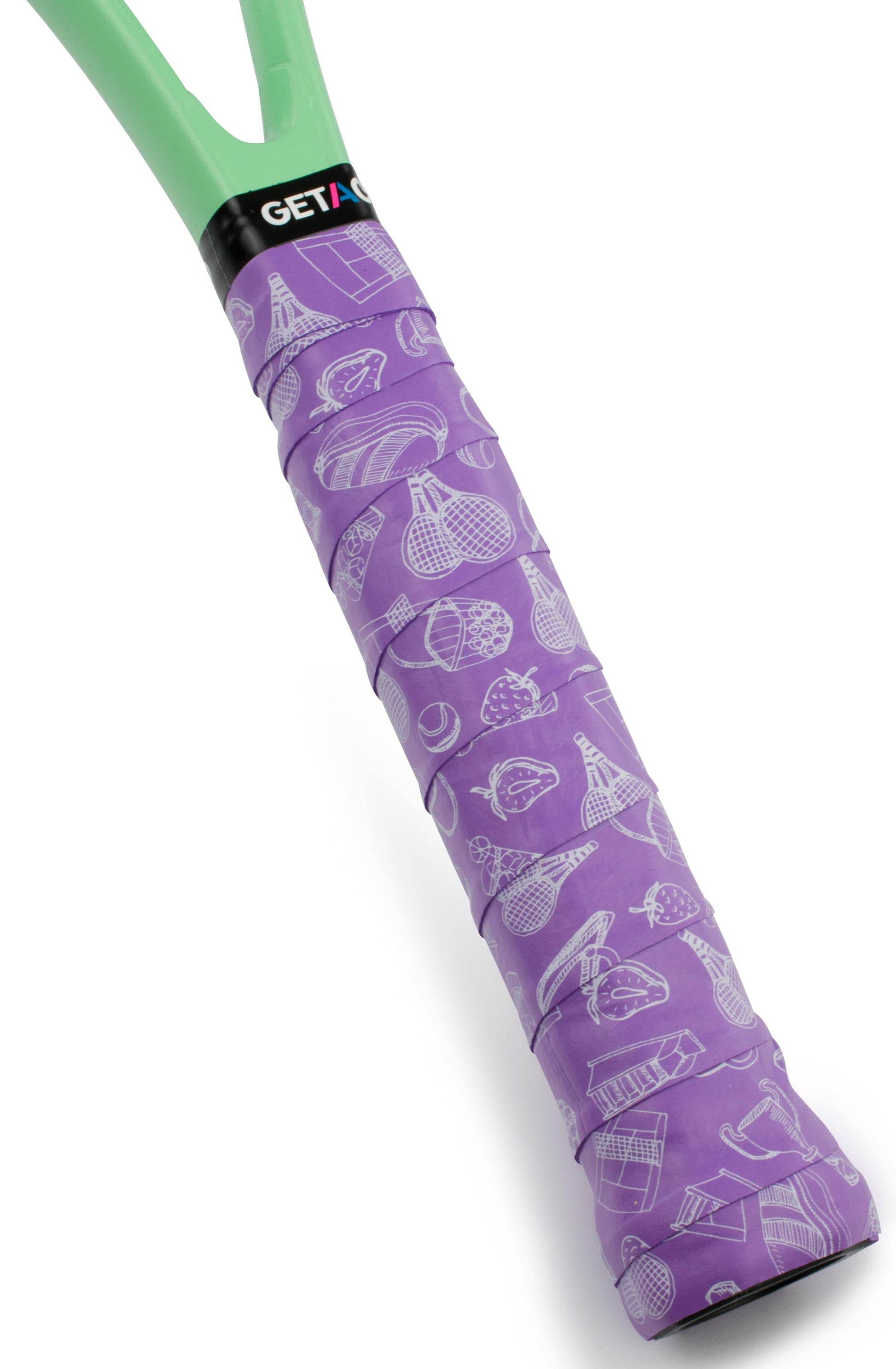 A close-up of the Get a Grip Tennis Overgrip – Ready? Play from Get A Grip, featuring a purple grip with white racquet, ball, and net illustrations and a light green upper handle—an ideal unique gift for tennis lovers.