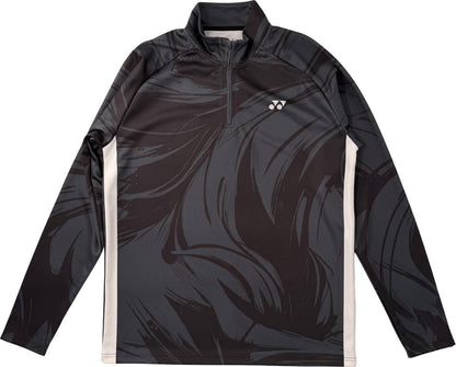 The Yonex YML6 Unisex Tennis Midlayer - Storm is a long-sleeve black and gray athletic pullover featuring an abstract pattern, quarter-zip collar, and a small white Yonex logo on the left chest. White panels run down the sides for added style, making this comfortable quarter-zip Yonex tennis midlayer ideal for layering. It’s perfect unisex tennis apparel for both on and off the court.