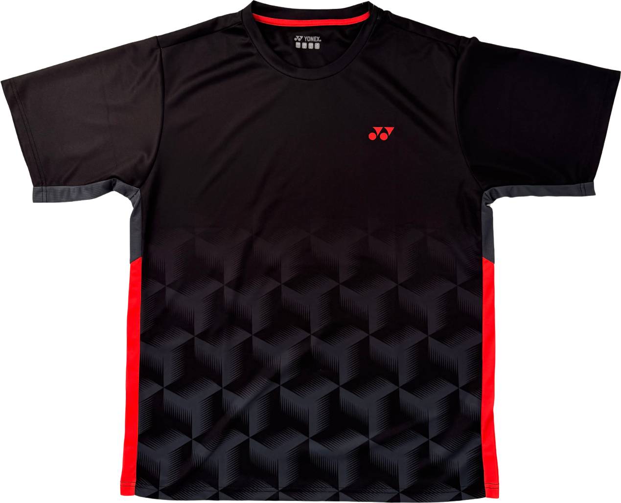 The Yonex YTM12 Mens Tennis T-Shirt in black is a stylish short-sleeve sports shirt, designed with a geometric cube pattern, striking red side panels, and finished with a small red Yonex logo on the left chest—ideal for men’s tennis.