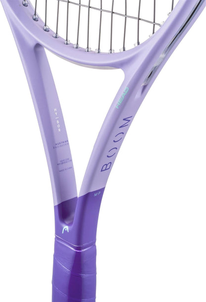 Close-up of the HEAD Boom MP Alternate 2026 Tennis Racket shows striking "BOOM" branding on the throat, with a matching purple grip. This HEAD racket delivers explosive power in every swing.