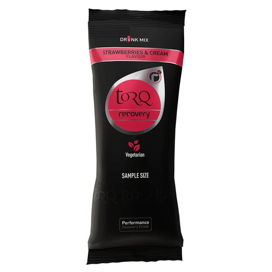 A black and pink sachet of Torq Recovery Sachet 50g - Strawberries & Cream provides a delicious strawberries and cream flavor with whey protein. The package is labeled as vegetarian, comes in a sample size, and is ideal for post-exercise nutrition.