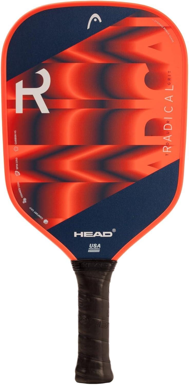 The HEAD Radical Tour Grit 2024 Pickleball Paddle in orange and navy features the HEAD logo, a black grip handle, and Foamed Core Technology for enhanced performance.