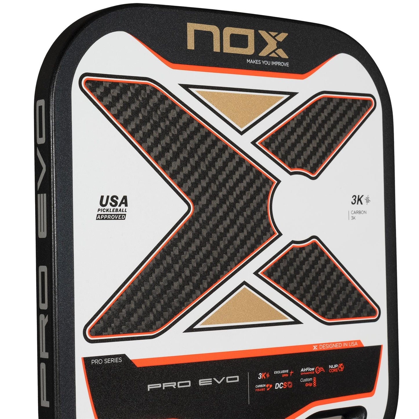 Close-up of the NOX Pro Evo Pickleball Paddle by NOX in black and red, featuring a bold "X" 3K Carbon Fibre design, USA Pickleball Approved label, Exclusive Spin Technology, and stylish product details.