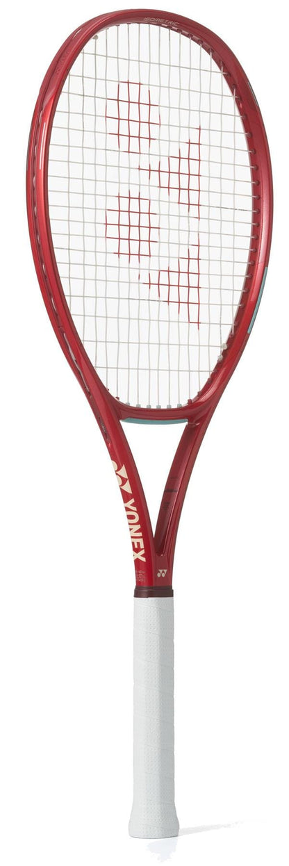 The Yonex VCORE 98 Tour Ruby Red 2026 Tennis Racket is a red racket with white strings and grip, featuring Yonex branding and designed to maximize spin on every shot.