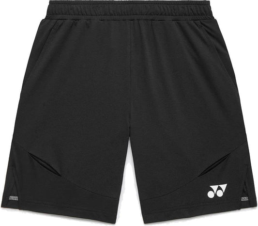 The Yonex 15239YX Knit Men's Tennis Shorts in black, by Yonex, feature lightweight fabric, an elastic waistband, two side pockets, and a white Yonex logo on the lower left leg.