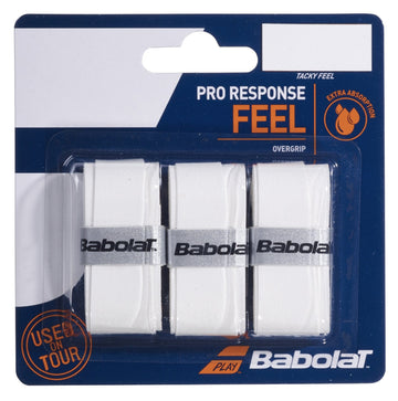 The packaging of the Babolat Pro Response Tennis Overgrips X3 - White displays three grips and emphasizes features such as "extra absorption," "used on tour," and a tacky feel, making it perfect for enhanced performance.