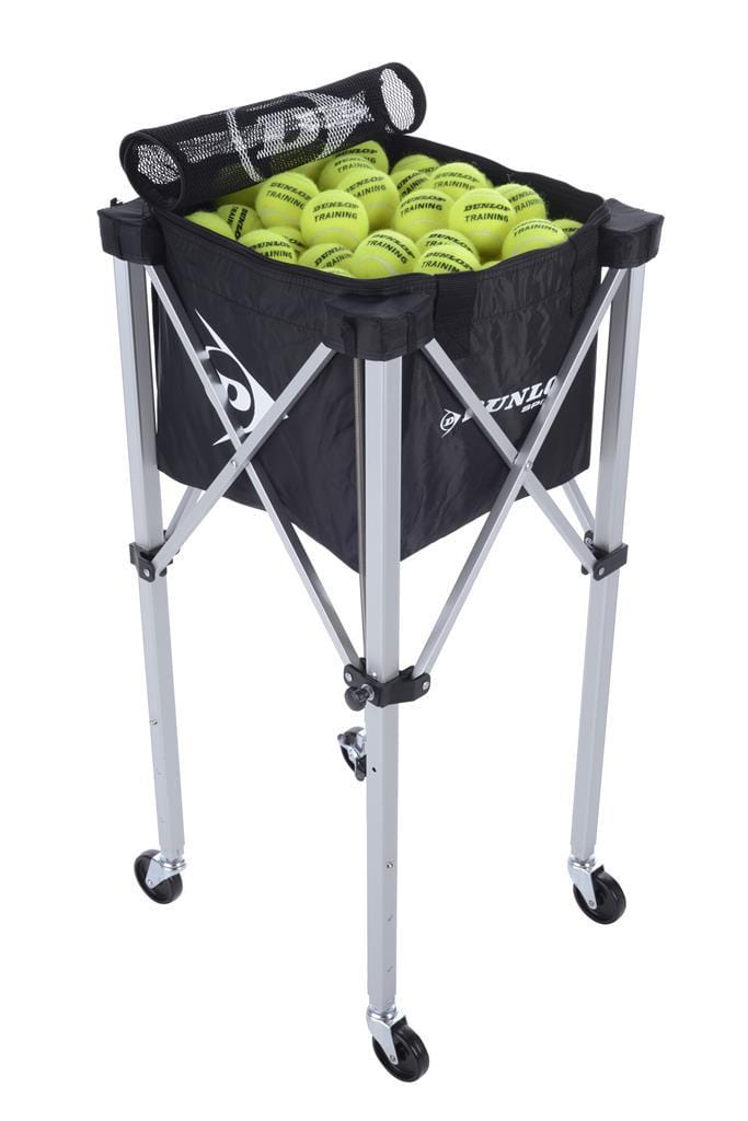 The Dunlop Foldable Teaching Tennis Ball Cart, in black and silver, includes a detachable ball bag filled with yellow tennis balls. Its basket is raised on a collapsible stand with four wheels, ensuring easy mobility and making it ideal for coaching sessions.