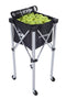 The Dunlop Foldable Teaching Tennis Ball Cart, in black and silver, includes a detachable ball bag filled with yellow tennis balls. Its basket is raised on a collapsible stand with four wheels, ensuring easy mobility and making it ideal for coaching sessions.