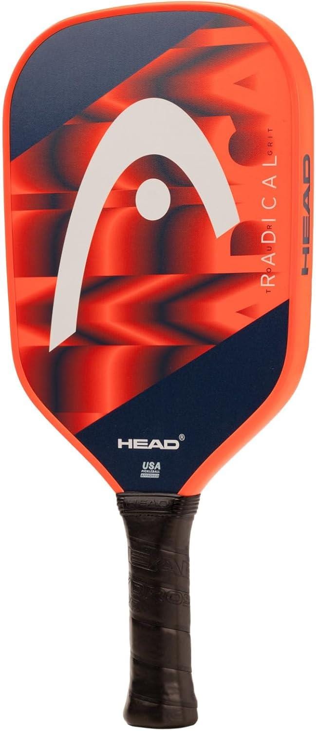 The HEAD Radical Tour Grit 2024 Pickleball Paddle in orange and navy features the HEAD logo, a black grip handle, and SpinGrid technology for enhanced control and spin on every shot.