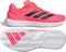 Bright pink adidas Defiant Speed 2 Mens Tennis Shoes - Solar Turbo / Core Black / Cloud White with black side stripes and a white multi-directional Ubersonic outsole tread.