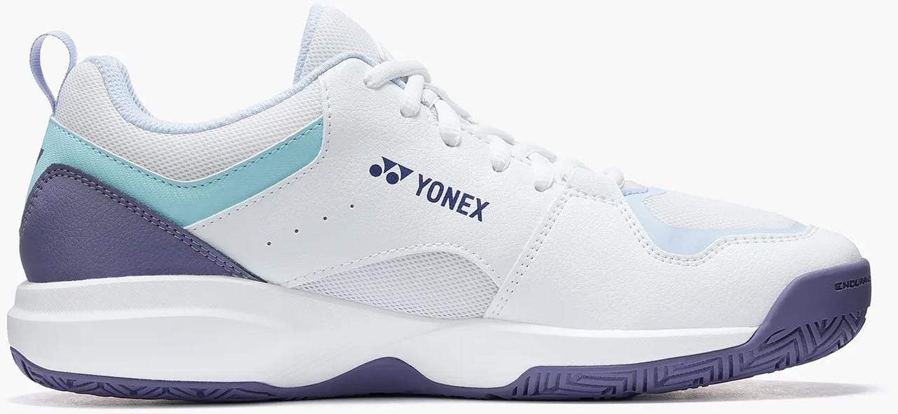 The Yonex Pro-Move Classic Mens Tennis Shoes in White/Sax feature a lace-up design, blue and purple accents, textured sole, advanced Power Cushion technology, and are shown from the side.