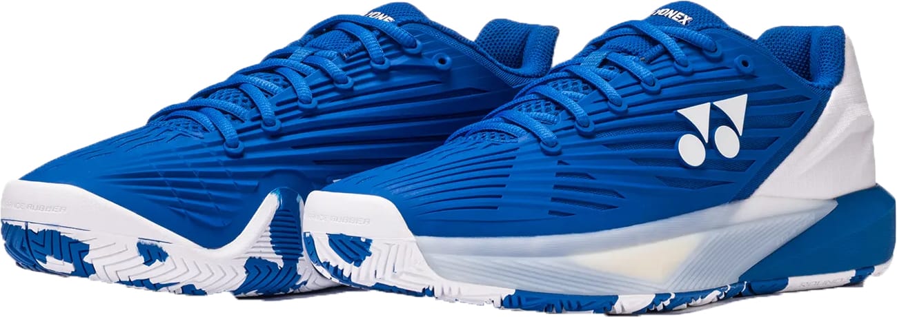 The Yonex Power Cushion Eclipsion 5 Men’s Tennis Shoes in blue and white feature a textured design, Yonex logo, and are engineered for stability on the court.