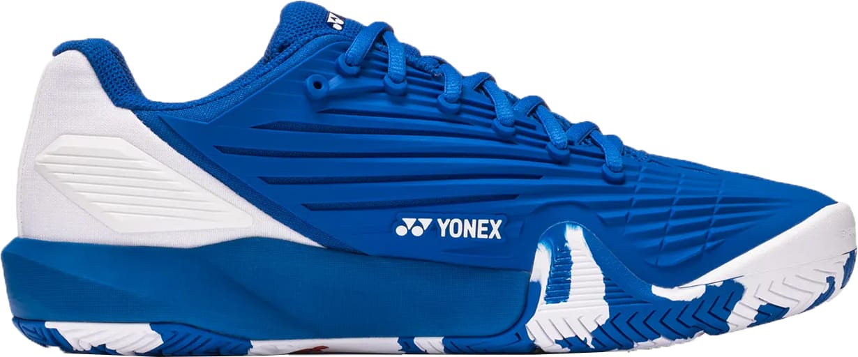 The Yonex Power Cushion Eclipsion 5 Men's Tennis Shoes in blue and white feature a textured design, white heel accents, the Yonex logo on the side, and a patterned sole for superior traction and stability.
