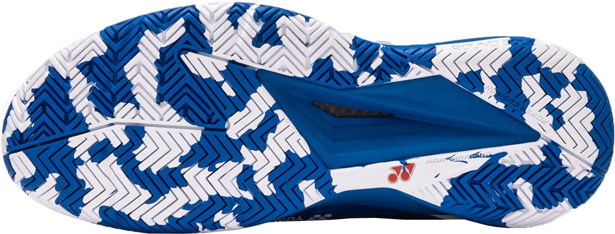 Close-up of the blue and white sole on Yonex Power Cushion Eclipsion 5 Mens Tennis Shoes, showing a detailed zigzag tread for superior grip and traction.