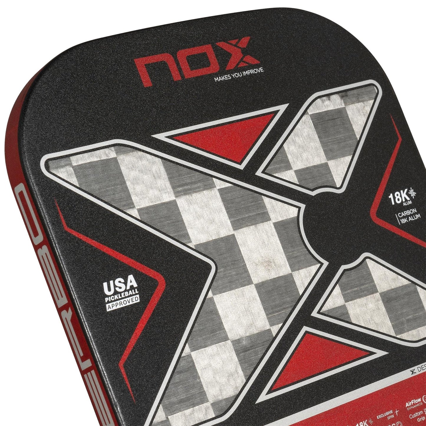 Close-up of the NOX Luxury Nerbo Pickleball Paddle in black and red, showing a bold "X" design. Features aluminised 18K carbon fiber, Exclusive Spin technology, and is labeled "USA Pickleball Approved." Brand: NOX.