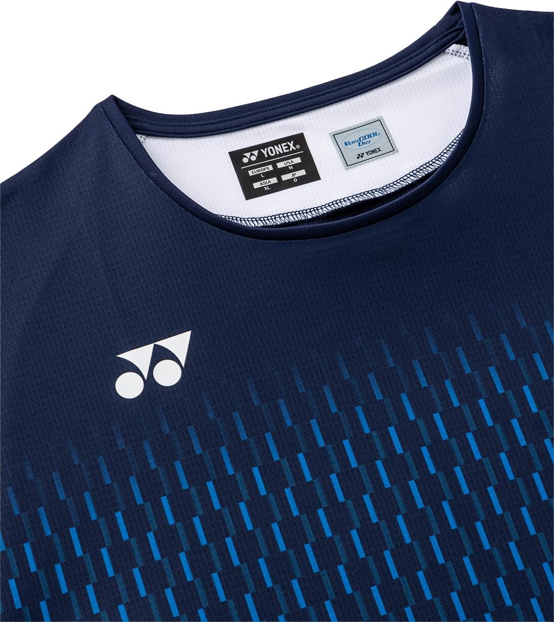 Close-up of the Yonex 10713EX Crew Neck Men's Tennis T-Shirt in Dark Navy, featuring a white Yonex logo, blue rectangular stripes, and visible neck tag. This Yonex shirt ensures excellent moisture management for active comfort.