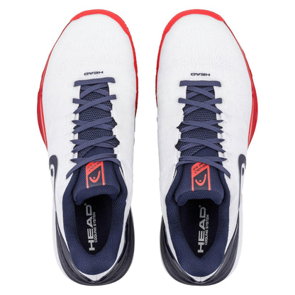 A pair of HEAD Revolt Pro 5.0 Mens Tennis Shoes in White/Navy, featuring navy laces, navy and black interior, red-accented soles. "HEAD" appears on the tongue and insole—ideal for baseline players.
