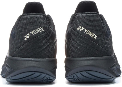 Rear view of Yonex Power Cushion Sonicage Men's Tennis Shoes in Black / Mocha Grey, highlighting the Yonex logo and name on the heel against a white background.