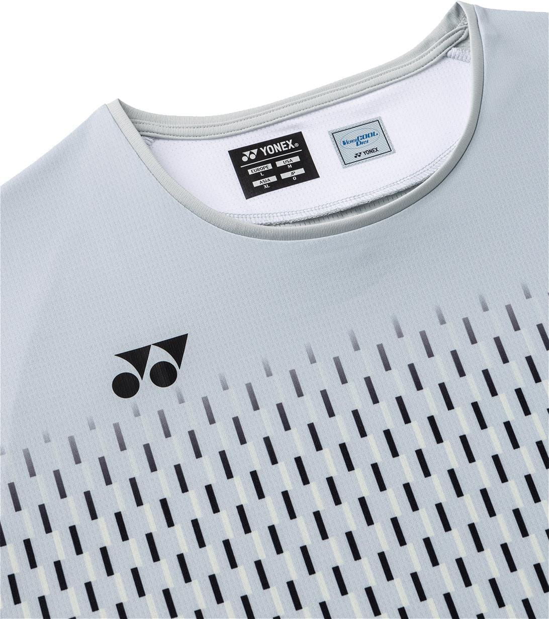 Close-up of the Yonex 10713EX Crew Neck Men's Tennis T-Shirt in Silver Grey, featuring a black Yonex logo on the chest, subtle vertical line pattern, visible neckline and tags, and advanced moisture management fabric.
