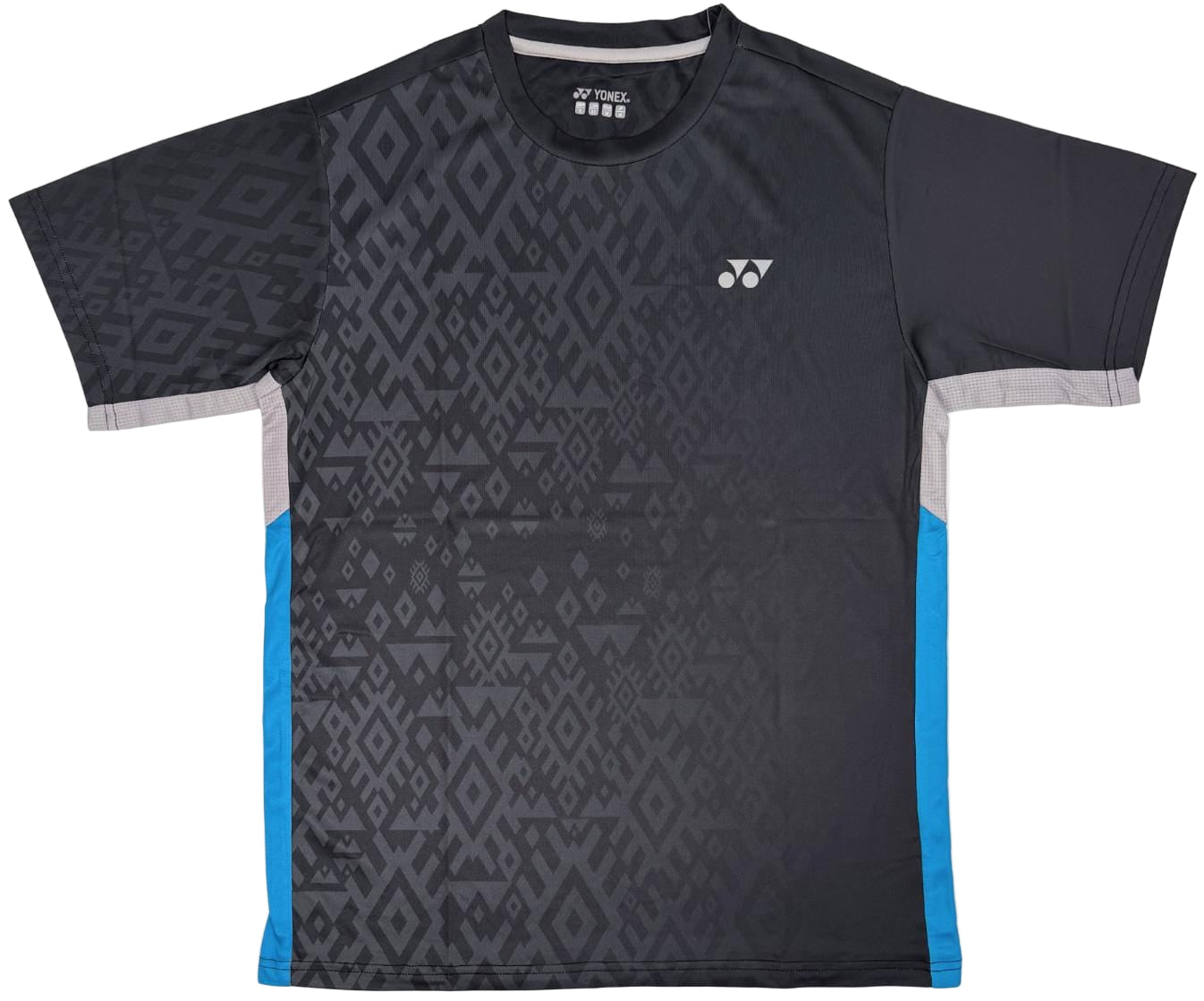 The Yonex YTM11 Men's Tennis T-Shirt in black features a dark geometric pattern, blue side panels, light gray cuffs, and a small white logo. Made with Air-Release fabric for fast drying. Displayed flat on a plain background.
