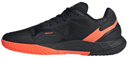 The adidas ADIDAS Defiant Speed 2 Men's Tennis Shoes in black and orange feature mesh and textured materials, black laces, "ADITUFF" on the side, and a lightweight design inspired by athletic sneakers.