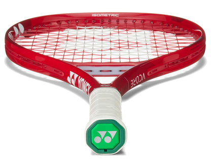 The Yonex VCORE 25 Junior Ruby Red 2026 Tennis Racket features a red graphite frame with "ISOMETRIC" at the top, white strings, a green logo on the handle base, and is shown against a white background.