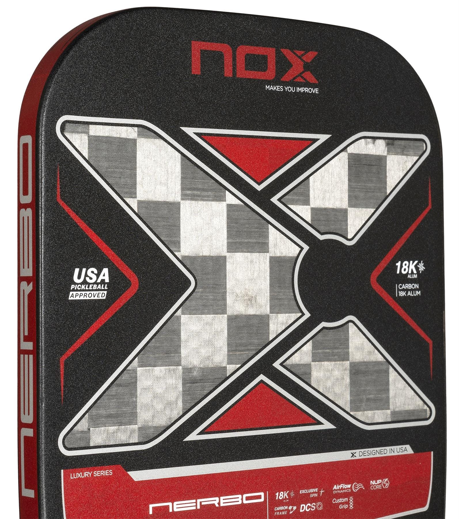 Close-up of the NOX Luxury Nerbo Pickleball Paddle - Black / Red by NOX, showing its large "X" pattern, checkerboard design, red and black borders, aluminised carbon fibre details, USA Pickleball Approved mark, and Exclusive Spin technology.