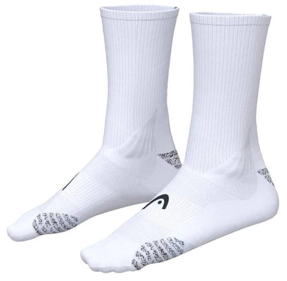 The HEAD Colour Crew Tennis Socks in white and turquoise feature ribbed cuffs, black logo and side patterns, zonal cushioning for comfort, and are designed for athletic tennis performance.