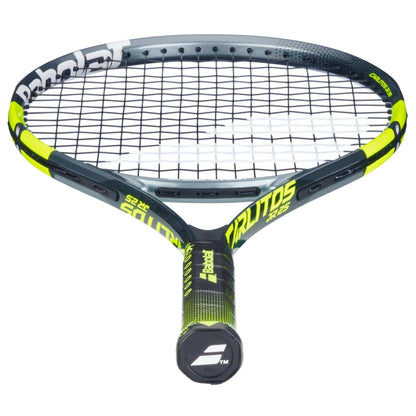 A close-up of the Babolat Carlitos Junior 25 Tennis Racket by Babolat, designed for beginners, featuring a black and neon yellow frame, visible strings, and "BRUTOS 25" labeled near the handle.