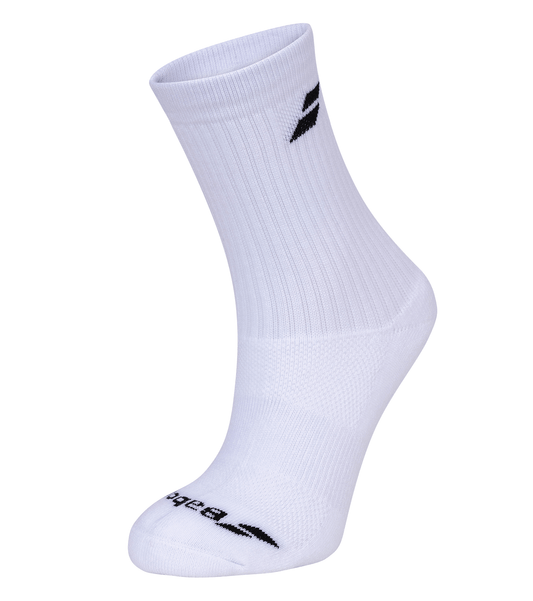 A Babolat Long Sock from the White 3 Pack is showcased against a white background, featuring a ribbed texture and a black logo near the top. The sock is designed for comfort and breathability, appearing pristine and unused.