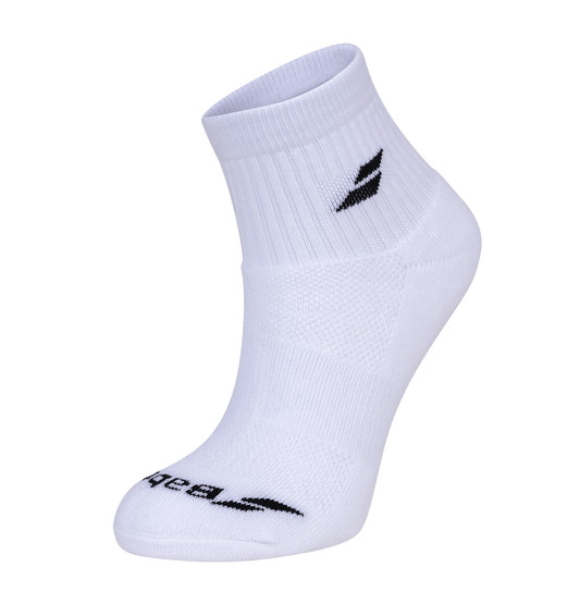 The Babolat Quarter Socks 3 Pack in white showcases a stylish black logo and text near the toes, set against a plain white background that accentuates the ribbed detailing around the ankle to enhance comfort and breathability.