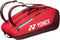 The Yonex 42529EX Team 9 Racket Tennis Bag in ruby red features black zippers, blue accents, and two dark brown straps. The white Yonex logo stands out on the side—ideal for carrying your tennis gear in style.