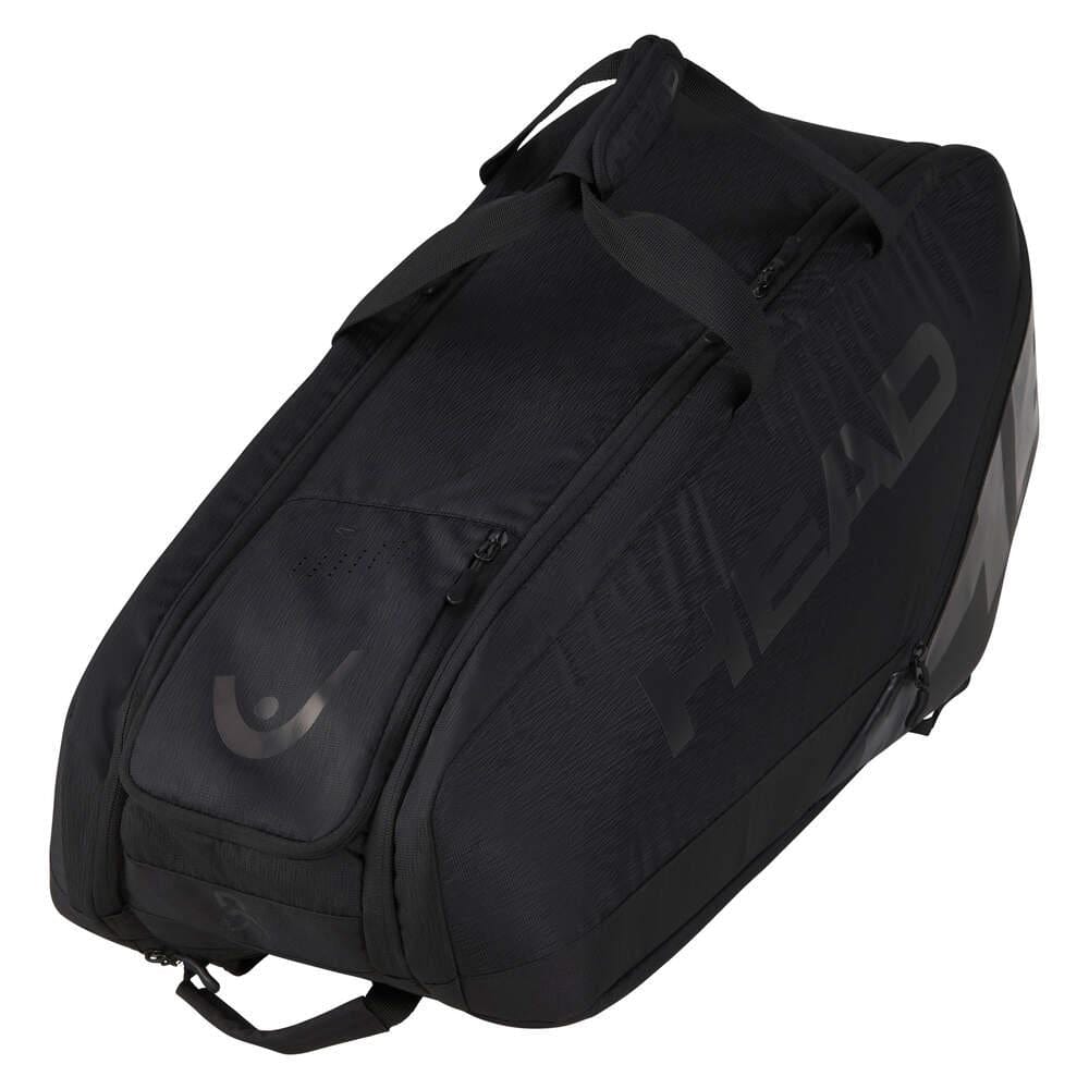 The HEAD Pro X Legend 9 Tennis Racket Bag L - Black, a sleek and modern design endorsed by Novak Djokovic, features multiple compartments equipped with CCT+ climate control technology. With durable carrying handles and zippers, it ensures secure storage, while the "HEAD" logo prominently displayed on the side makes it perfect for transporting rackets and sports gear.