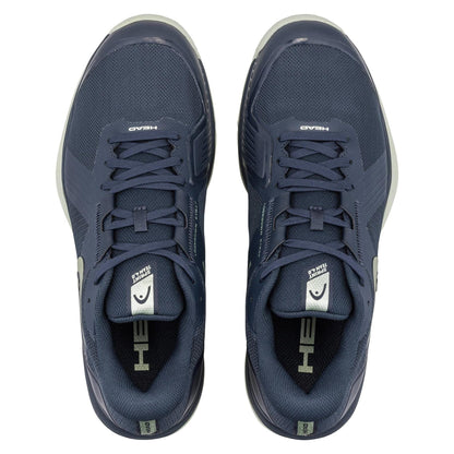 A pair of HEAD Sprint Team 4.0 Men's Tennis Shoes in navy and cantaloupe green, viewed from above, showing the HEAD logo on the tongues and insoles along with breathable design elements.