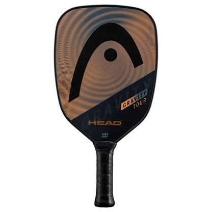 The HEAD Gravity Tour 2023 Pickleball Paddle in Black/Bronze features a large black HEAD logo on a brown and black face, SpinOn technology, "GRAVITY TOUR" text near the base, and a black handle.