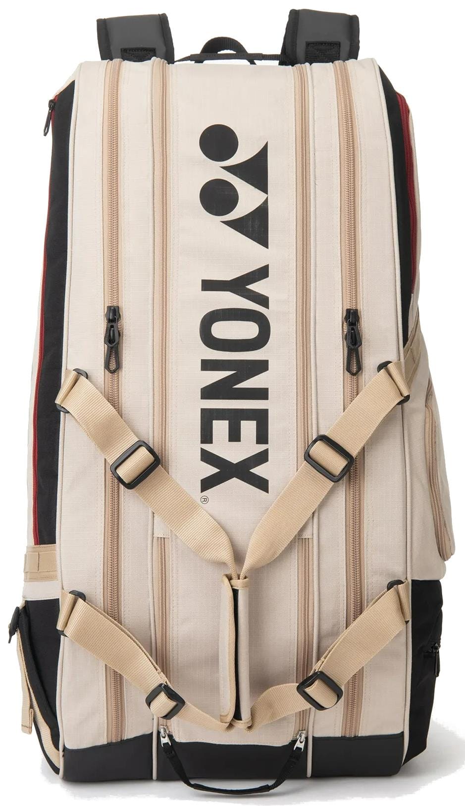 The Yonex BA72629EX Gearlogic 9 Racket Tennis Bag in beige features a black logo, multiple zippers, adjustable padded straps, and showcases its stylish front design—ideal for carrying your tennis gear.