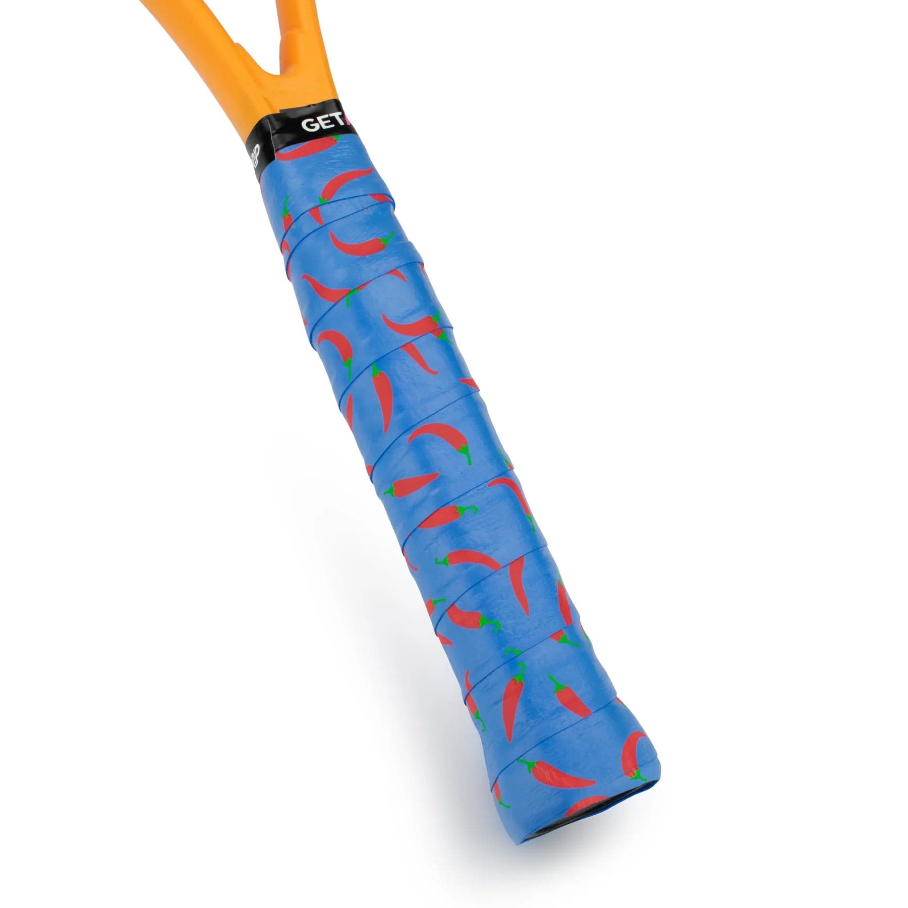 The handle of the tennis racket is wrapped with the Get A Grip Heatwave Tennis Overgrip in blue, featuring a red chili pepper pattern. It includes a black band with white text on top of the premium material. The frame of the racket showcases an eye-catching orange color.