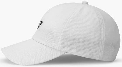 The Yonex 40125EX Tennis Cap in white is shown from the side, featuring a perforated, breathable texture, curved brim, adjustable fit, and part of the black Yonex logo on the front panel.