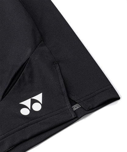 Close-up of Yonex 15239YX Knit Men's Tennis Shorts in black, featuring a breathable textured fabric and a pocket with the white Yonex logo near the seam—designed for performance on the court.