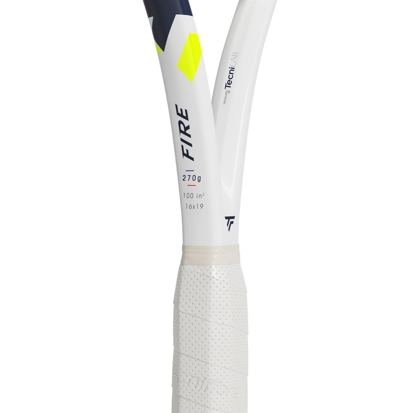 Close-up of the Tecnifibre Fire 270 Tennis Racket handle and lower frame, showing a textured grip, navy blue and bright yellow geometric designs, "FIRE" on the shaft, and vibration dampening technology for comfort.