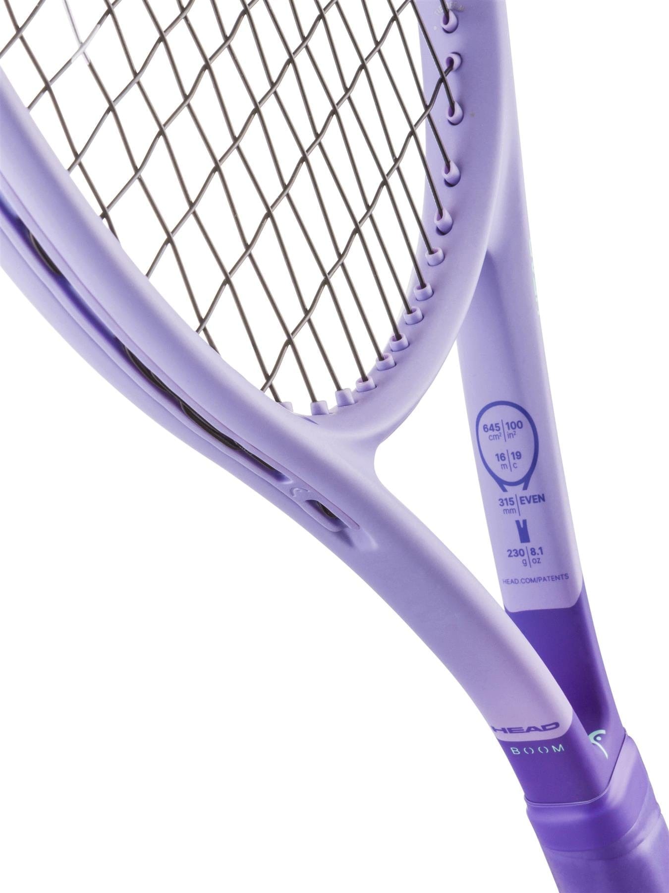 Close-up of a HEAD Boom Jr 25 Alternate 2026 Junior Tennis Racket in purple, showing the strings and frame. Technical specs and Hy-Bor technology are printed on the inner side near the handle of this HEAD junior tennis racket.